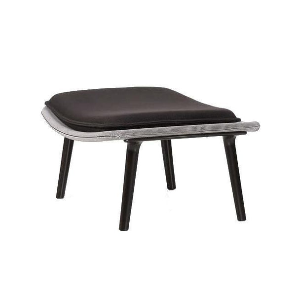 Black cushioned ottoman with sleek white edges and minimalist black legs, perfect for modern interiors.