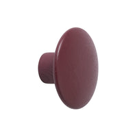 "Round burgundy knob with a smooth, matte finish, perfect for stylish cabinetry or furniture."