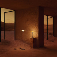 Stylish floor lamps with soft amber glow, set against earthy tones and minimalistic design in a warm, serene environment.