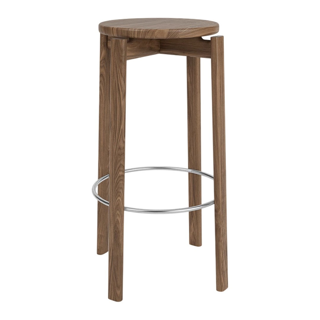 Round walnut bar stool with a sleek wooden finish and chrome footrest, featuring a simple, modern design.