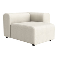 Cozy cream-colored accent chair with a minimalist design and smooth fabric texture, perfect for modern decor.