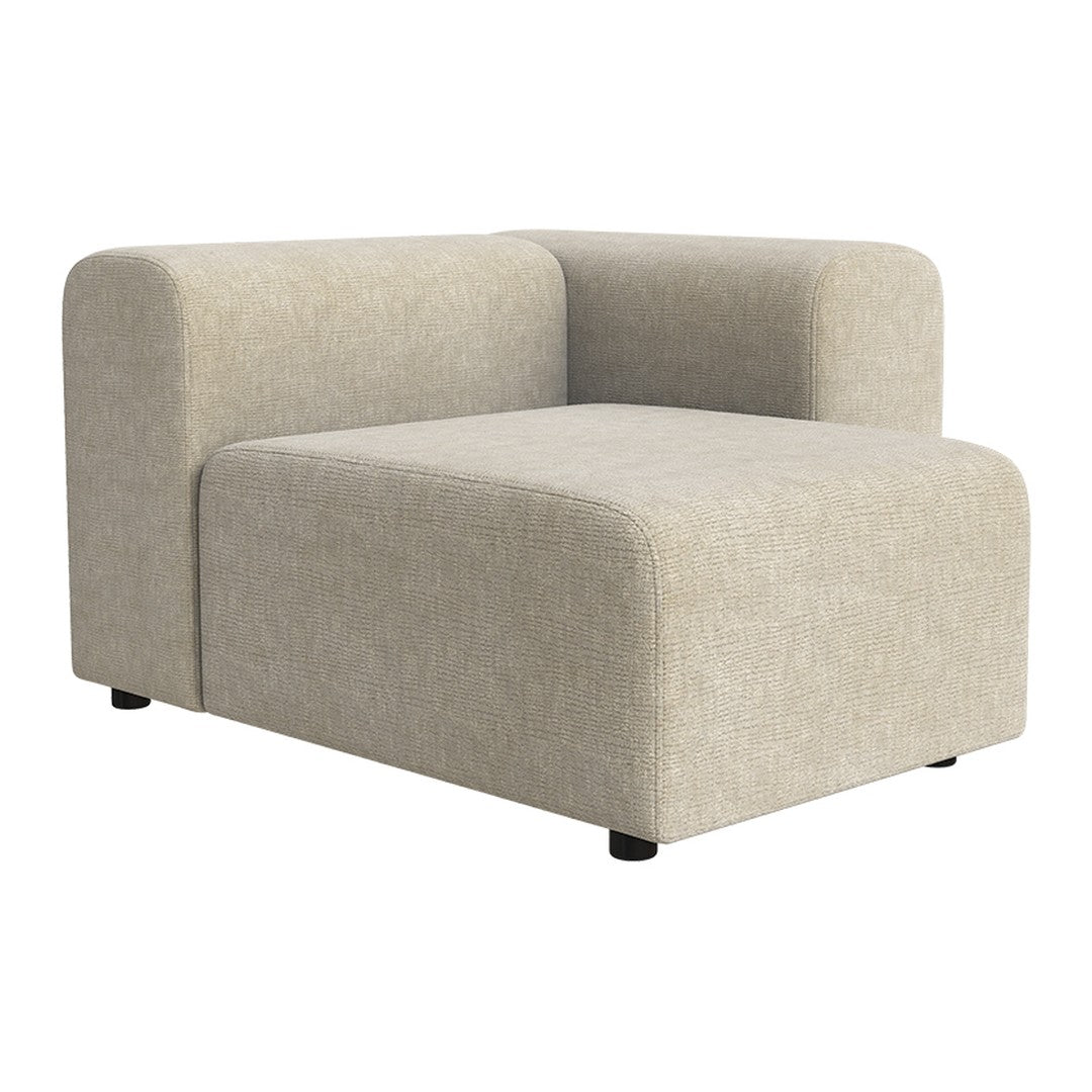 Beige modular sofa with a smooth texture and minimalist design, featuring rounded edges and subtle fabric patterns.