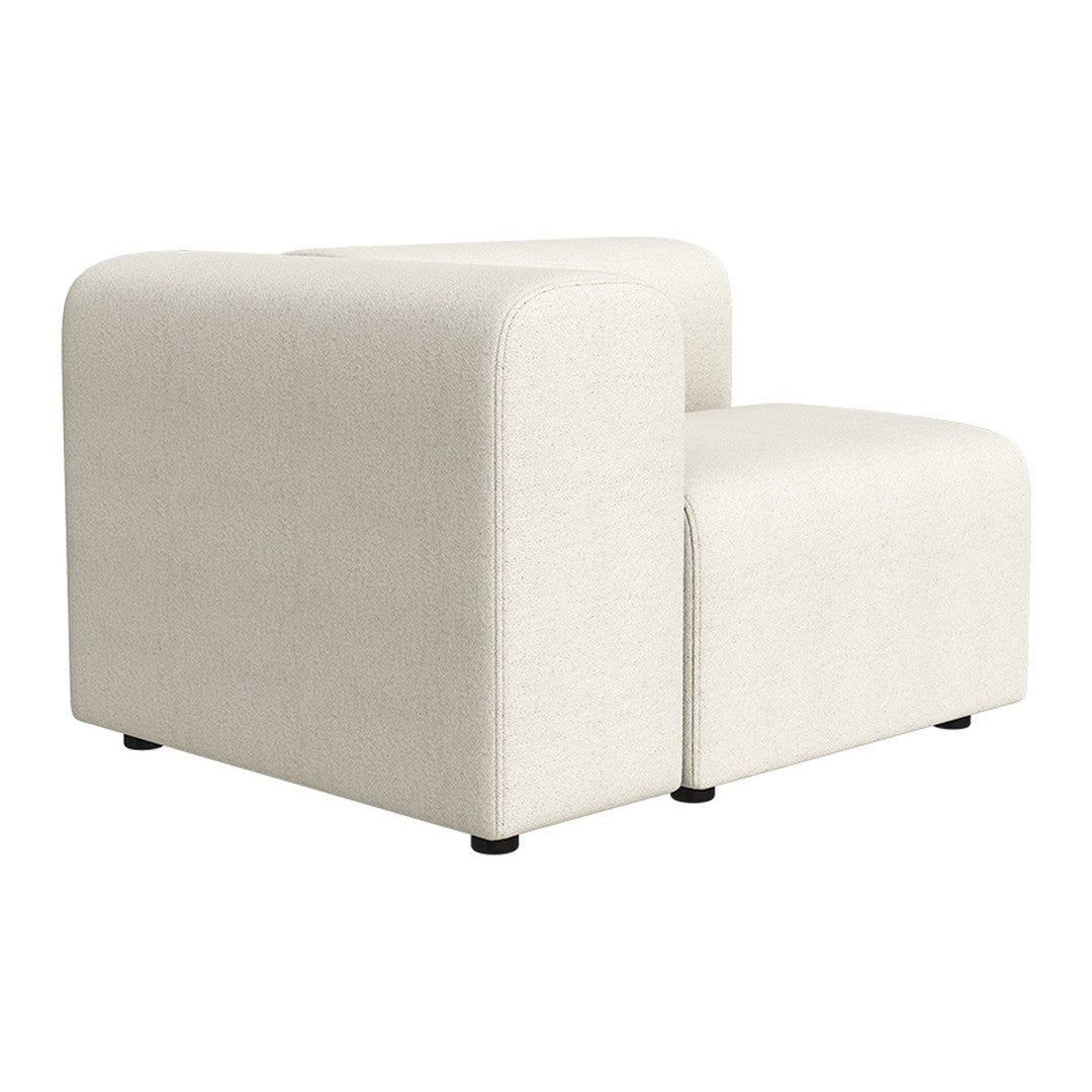 White fabric sectional sofa with a smooth texture and minimalist design, featuring rounded edges and clean lines.