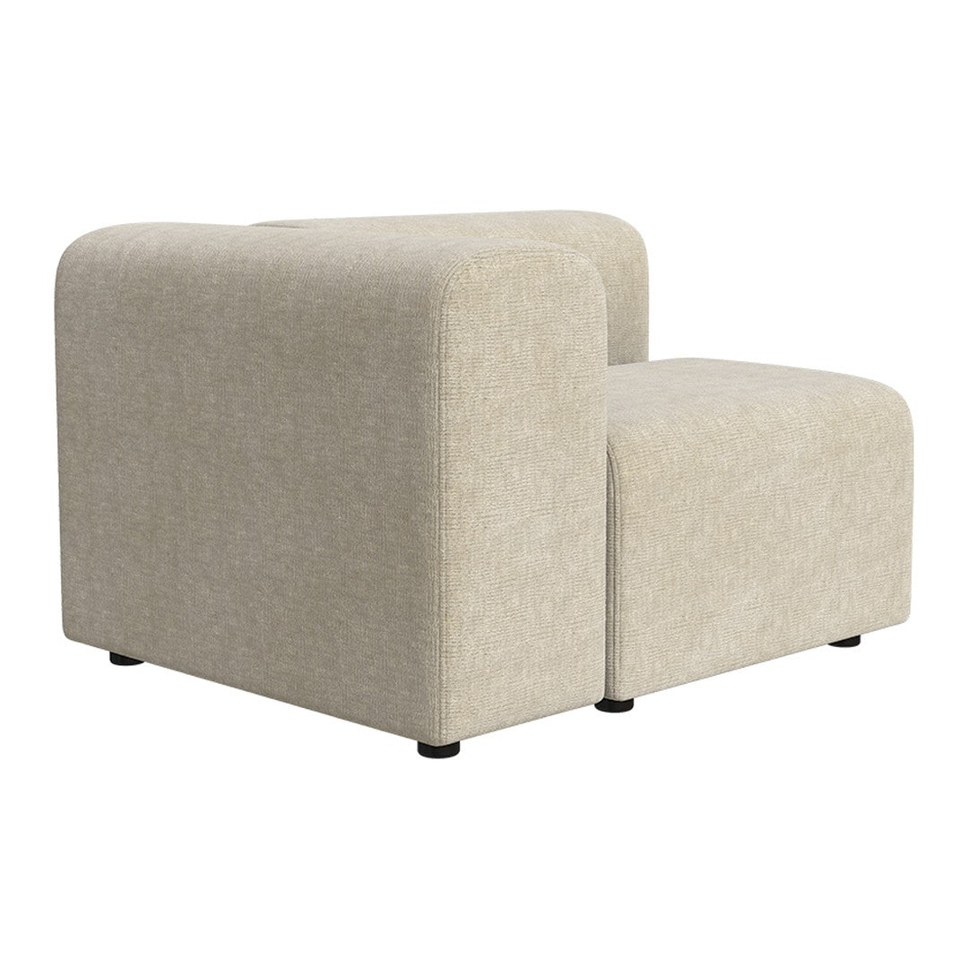 Beige modular sofa with soft texture and subtle pattern, featuring rounded edges and black legs for contrast.