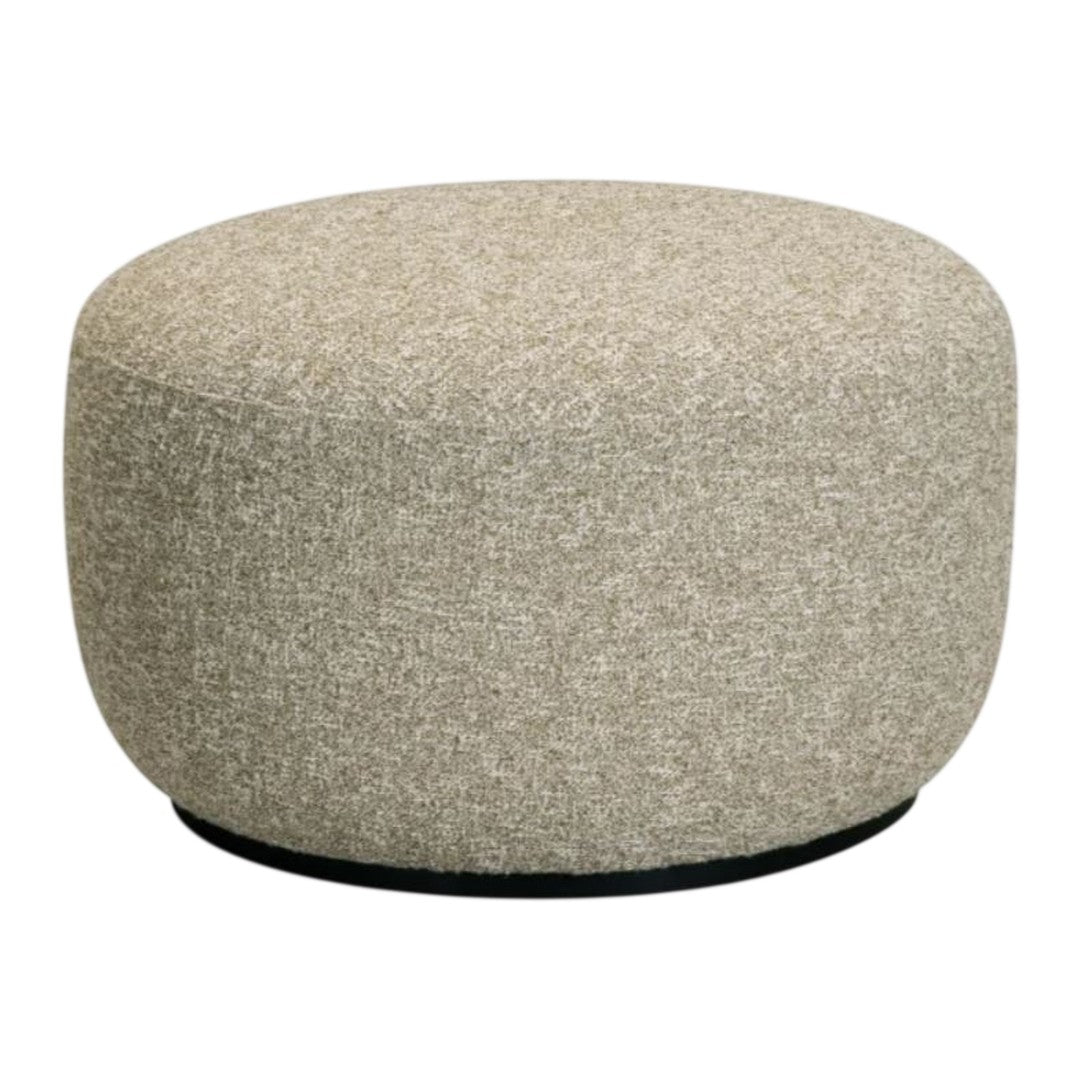 Round ottoman in soft beige fabric with subtle speckled pattern and contrasting black base.