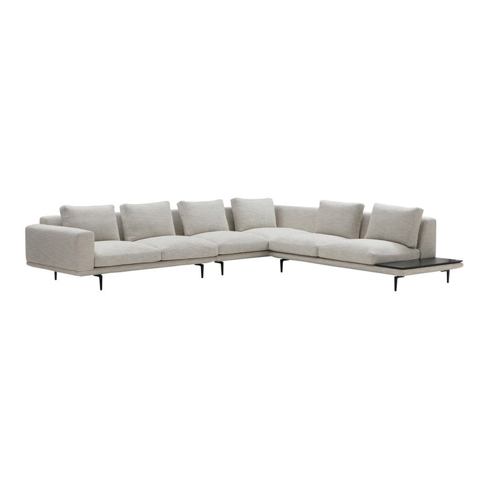 Light gray sectional sofa with a minimalist design and subtle texture, featuring plush cushions and sleek metal legs.