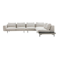 Light beige sectional sofa with a simple, modern design and plush cushions, featuring a sleek black base.