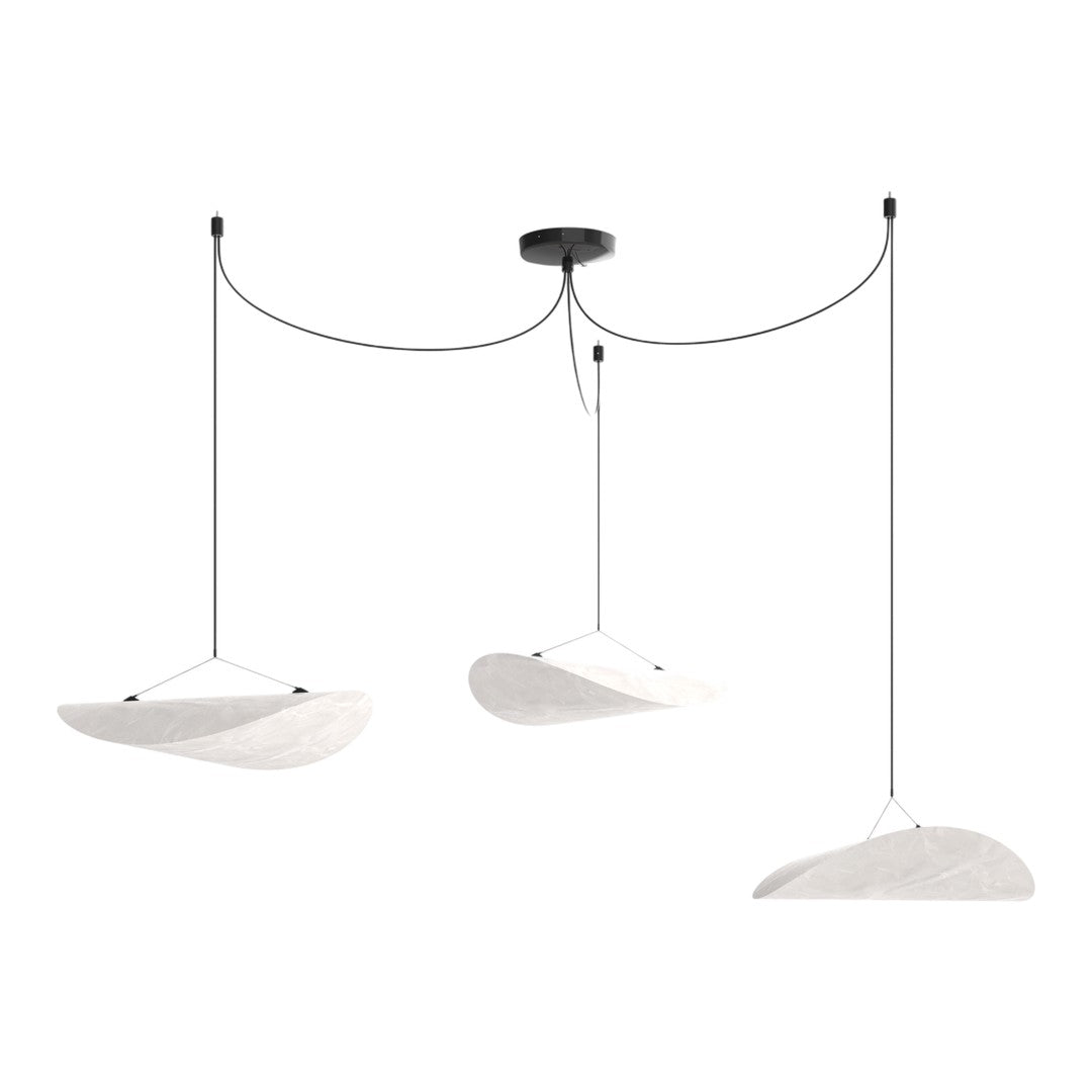 Modern pendant light with three white shades and black ceiling mount, featuring minimalist design and soft curves.