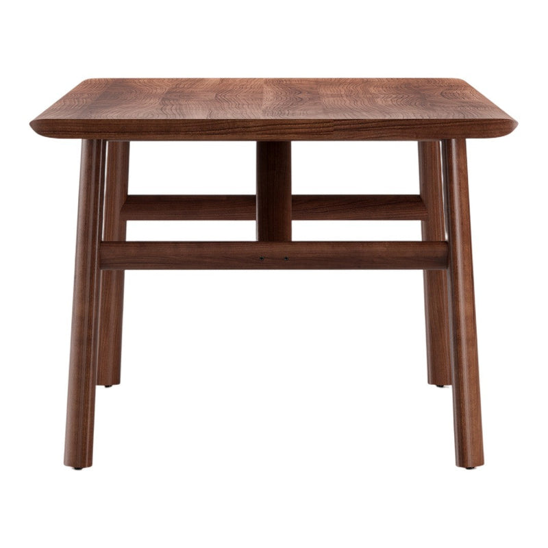 Wooden dining table in rich brown finish with a smooth surface and clean, modern lines. Perfect for any dining space.
