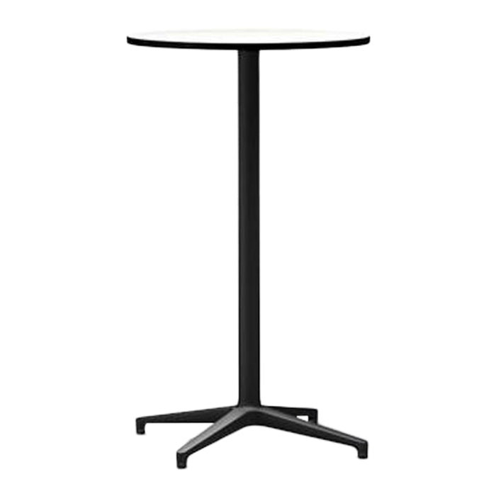 Modern round table with a sleek white top and a contrasting black base, featuring a minimalist design.