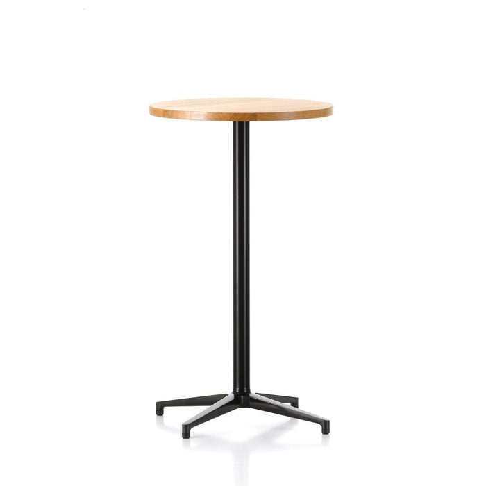 Round wooden tabletop in light natural finish with a sleek black metal base, minimalist design.
