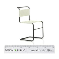 Minimalist chair featuring a cream seat and backrest with a sleek black metal frame. Modern and versatile design.