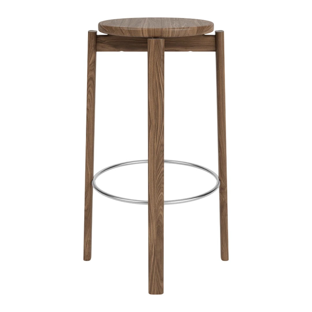 Brown wooden bar stool with a round seat and sleek legs, featuring a minimalist design and silver footrest.