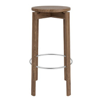 Brown wood oval table with a textured surface and smooth, modern design. Ideal for contemporary interiors.