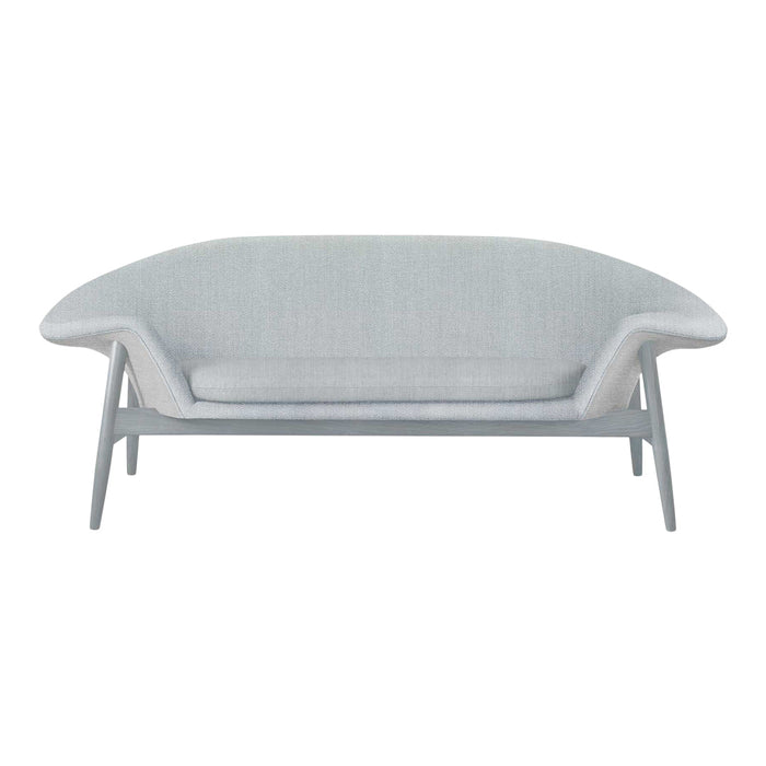 Light gray loveseat with a smooth, minimalist design and subtle textured pattern on the upholstery.