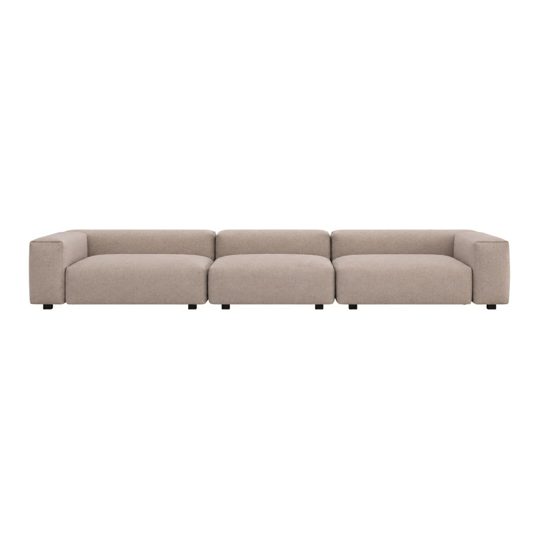 Beige modular sofa with a smooth, solid fabric design, featuring contemporary, clean lines. Ideal for modern decor.