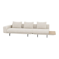 Light beige sofa with a minimalist design, featuring plush cushions and a sleek wooden side table.