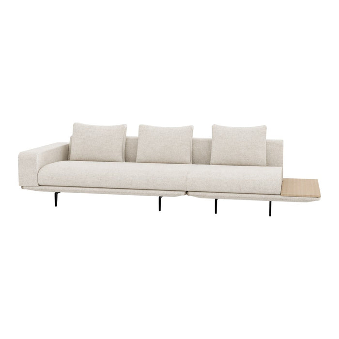 Light beige sofa with a minimalist design, featuring plush cushions and a sleek wooden side table.