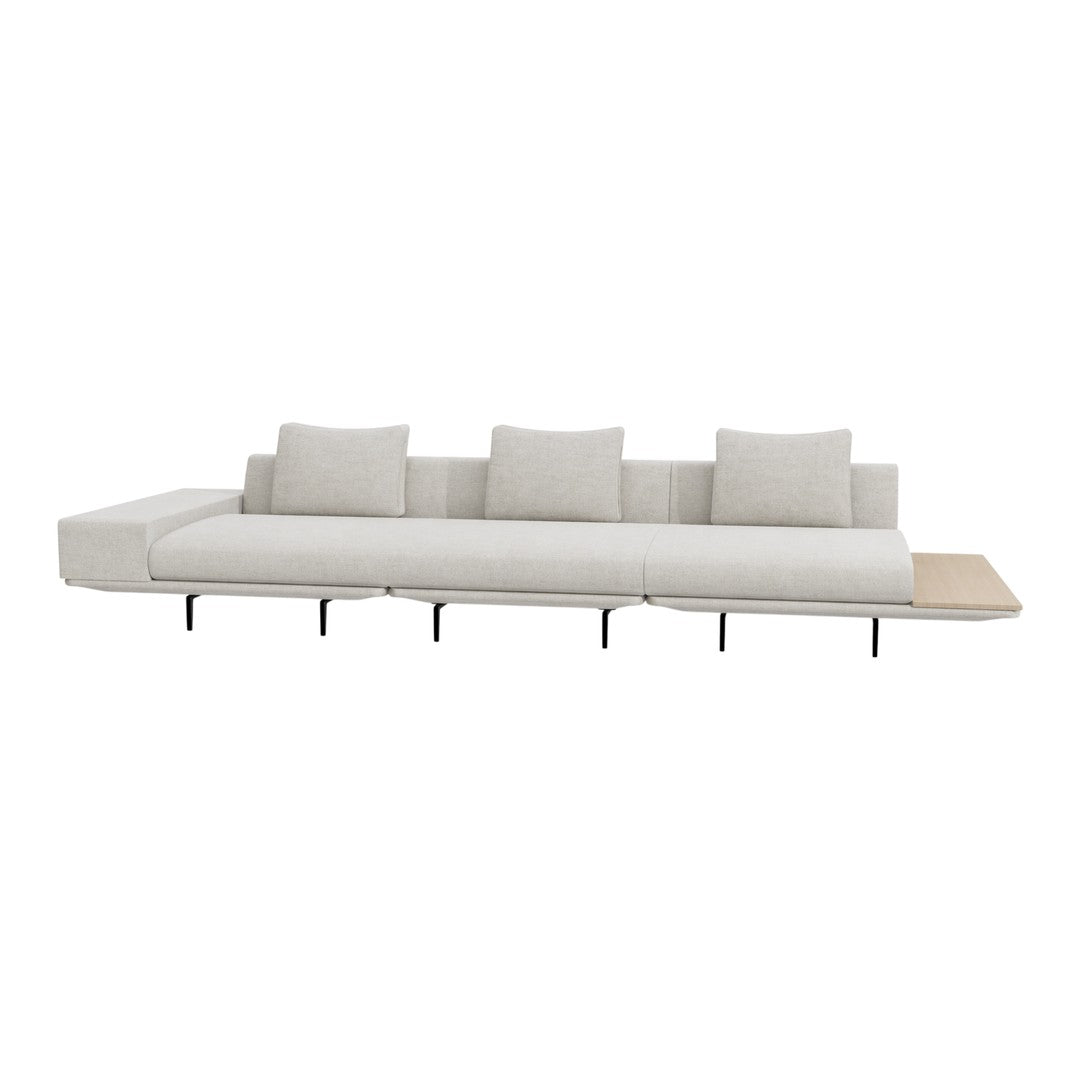 Modern light beige sofa with smooth upholstery and minimalist design, featuring clean lines and subtle textures.