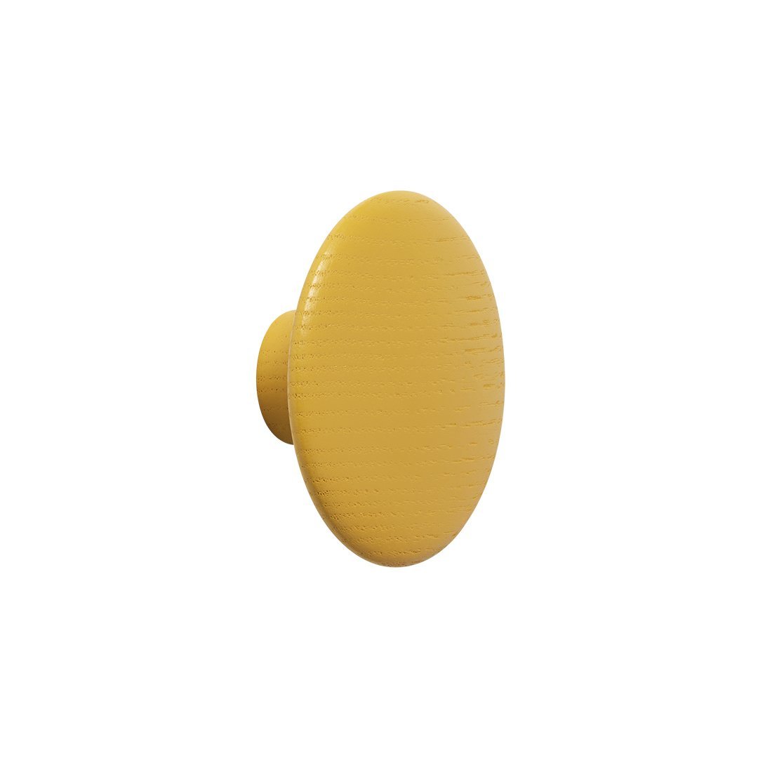 Round yellow knob with a smooth, textured surface, perfect for adding a pop of color to furniture.
